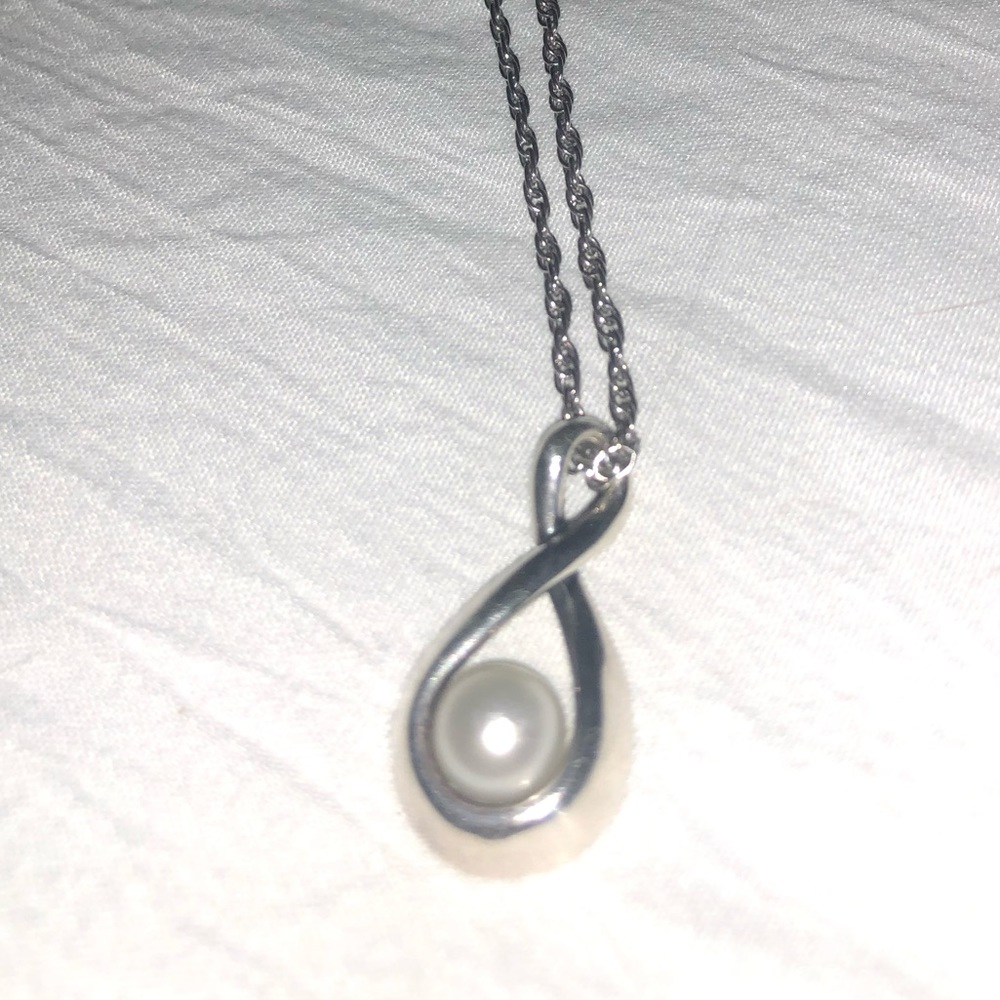 James Avery Pearl charm and 16 inch chain.
